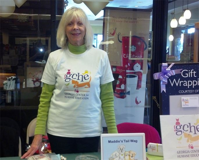 Janis Beavin at a table